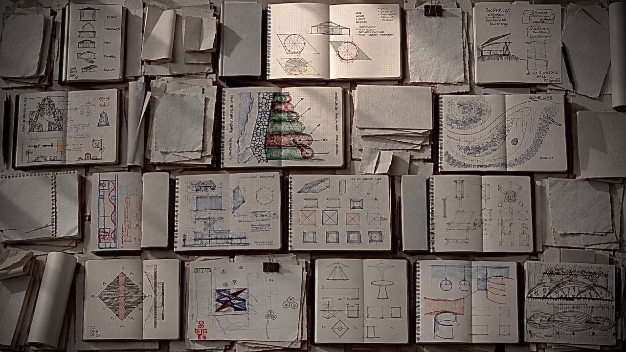 A wall of open sketchbooks, each spread a building being thought through